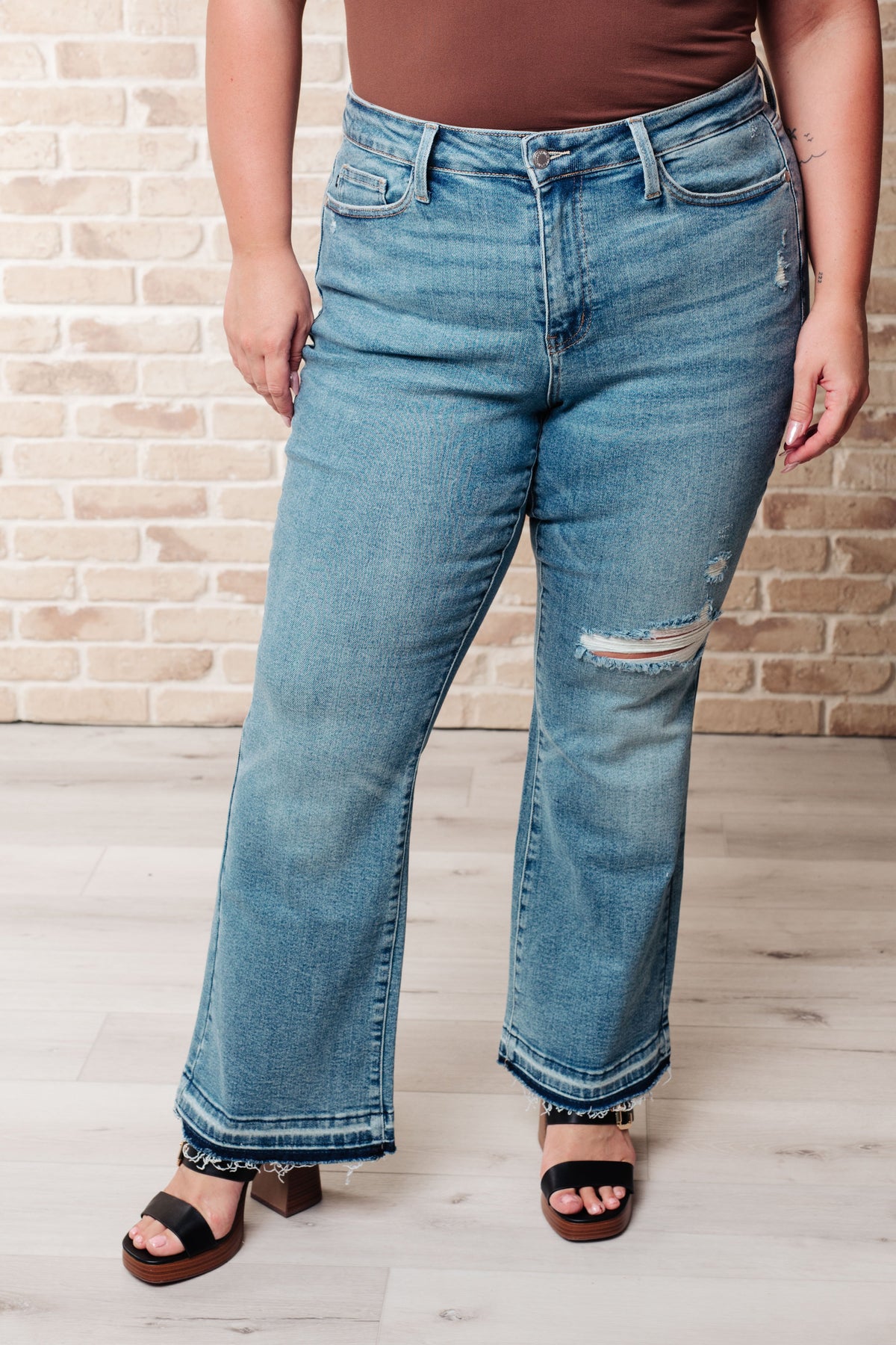 Isla Mid Rise Distressed Released Hem Bootcut Jeans Judy Blue