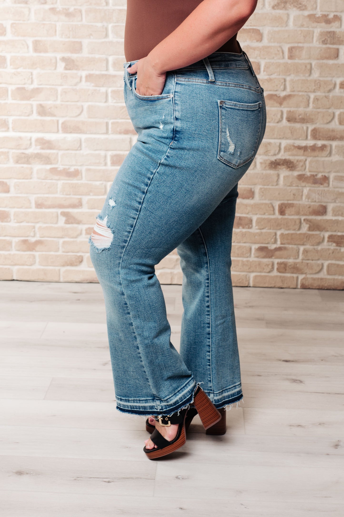 Isla Mid Rise Distressed Released Hem Bootcut Jeans Judy Blue