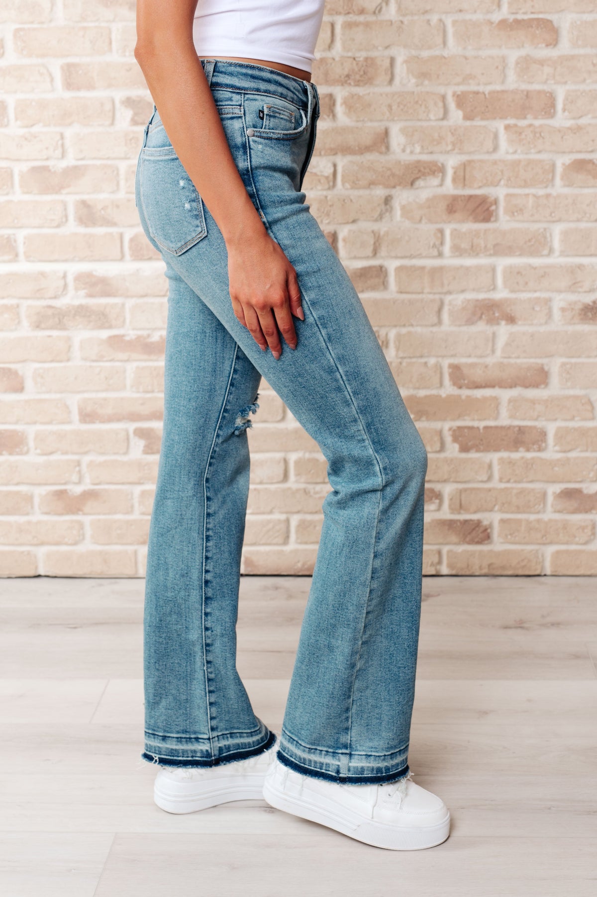 Isla Mid Rise Distressed Released Hem Bootcut Jeans Judy Blue